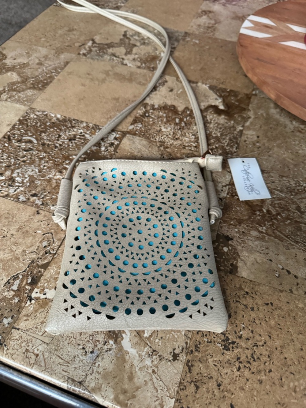 Catherine Kelly Turquoise Lined Aztec Laser Cut Cream Crossbody